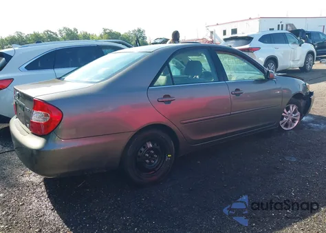 2004 Toyota Camry Le V6 from USA, damaged, VIN 4T1BF30KX4U570740